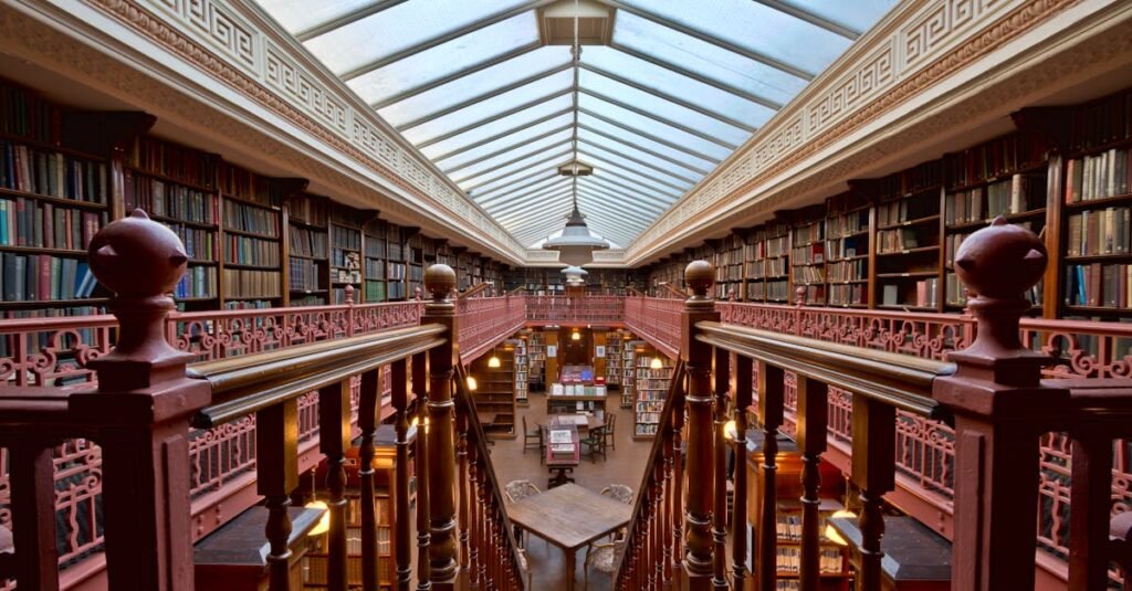 Explore the historic interior of Leeds Library with classic bookshelves and skylight.